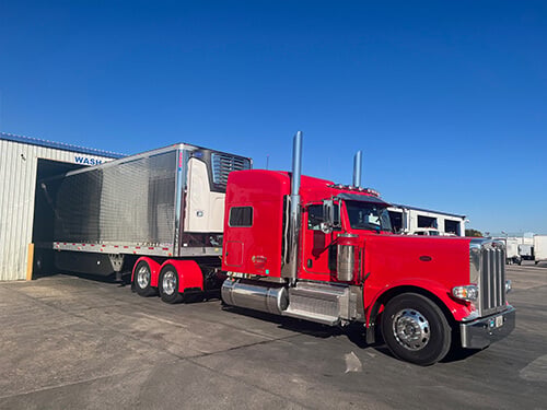 Semi truck in the wash bay at American Truck Trailer
